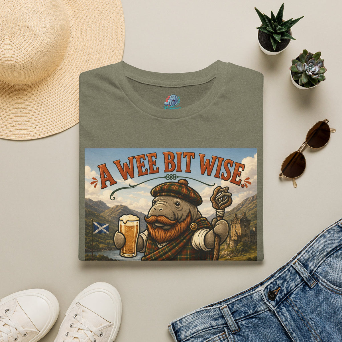 A Wee Bit Wise A Whole Lot Opinionated Shirt | Funny Scottish Manatee Tee | Highland Humor Graphic T-Shirt