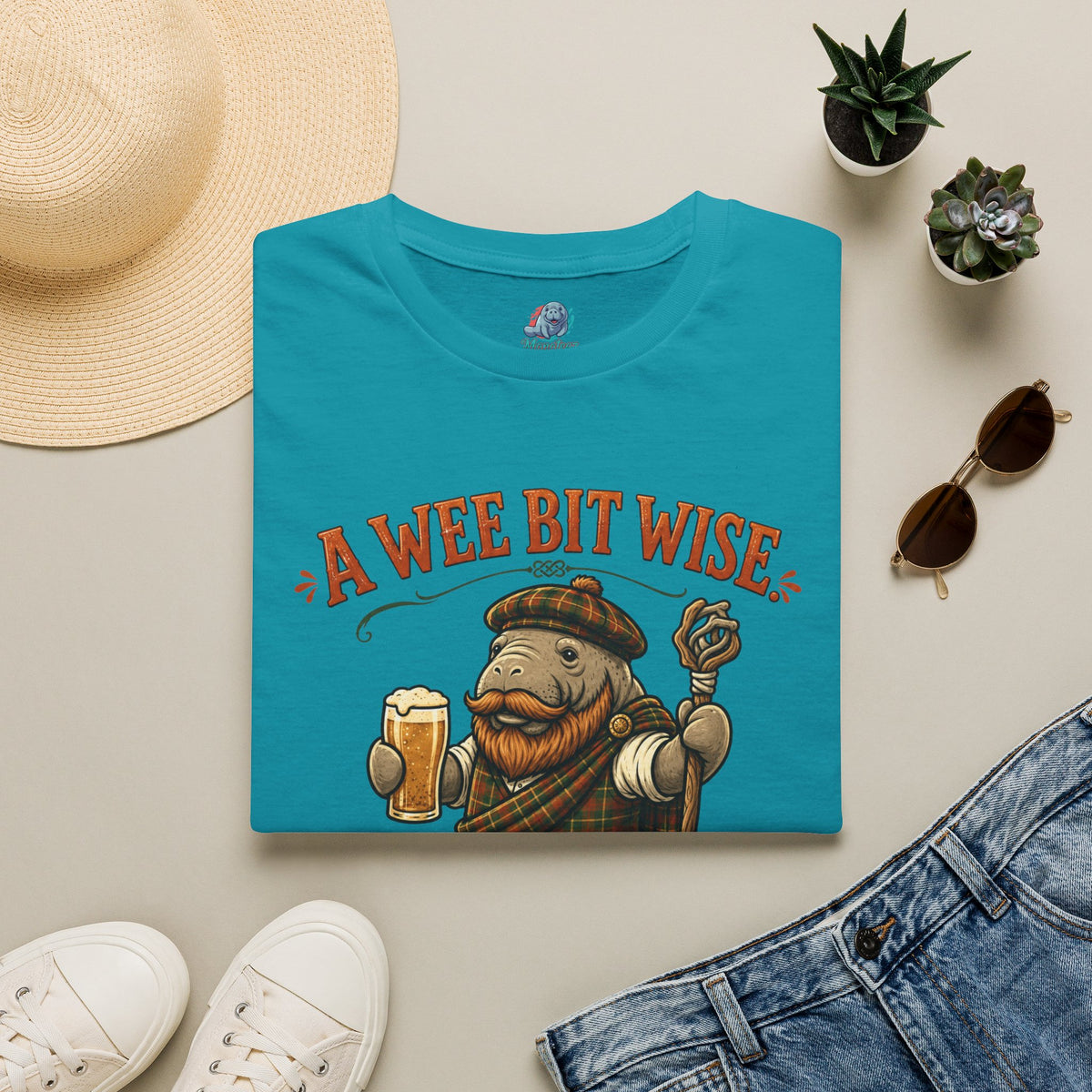 A Wee Bit Wise A Whole Lot Opinionated Shirt | Funny Scottish Manatee Tee | Highland Humor Graphic T-Shirt